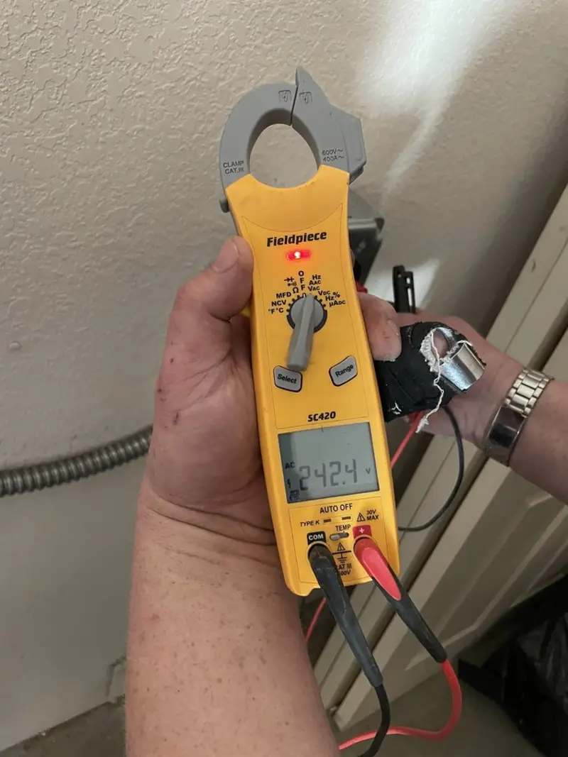 Voltage testing with clamp meter during Aluminum Wiring Replacement in Hyde Park